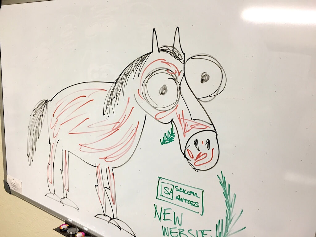 white board drawing of a horse