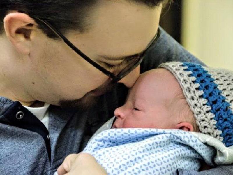 Ben Homan With Newborn Olivia Homan